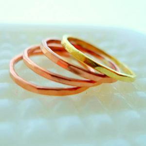 Three Copper And One Brass Stacking Rings Modest..