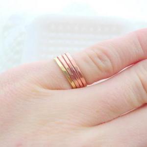 Three Copper And One Brass Stacking Rings Modest..