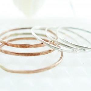Three Copper And Three Sterling Silver Stacking..